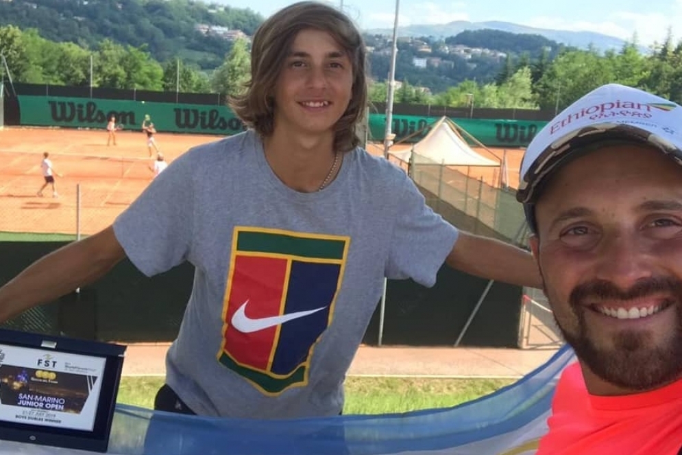 Nicolas Eli, junto a su entrenador Andres Chalcoff.