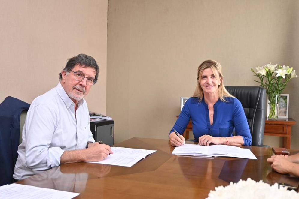 Fassi junto a Sileoni en su despacho.