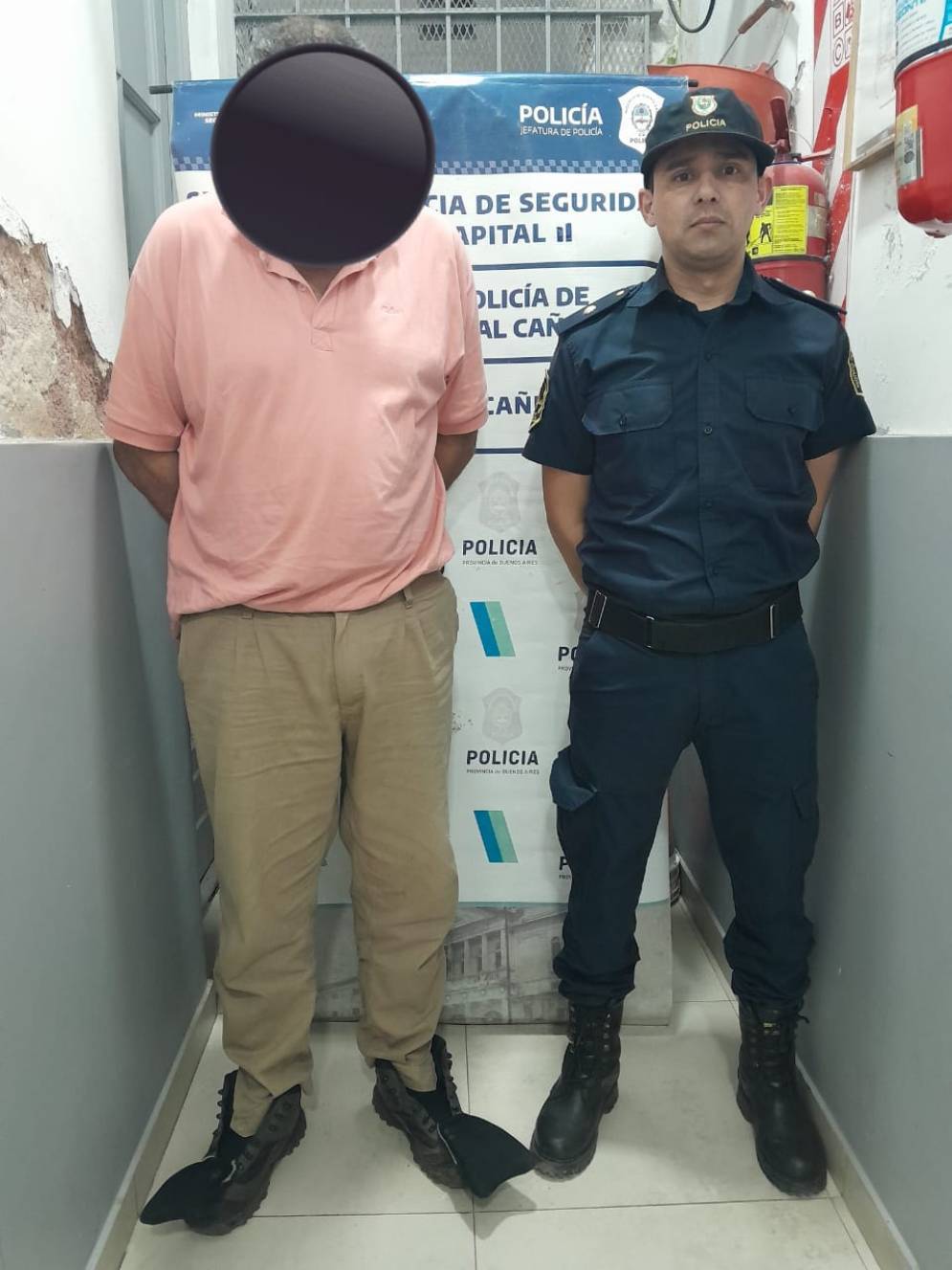 El imputado, detenido.
