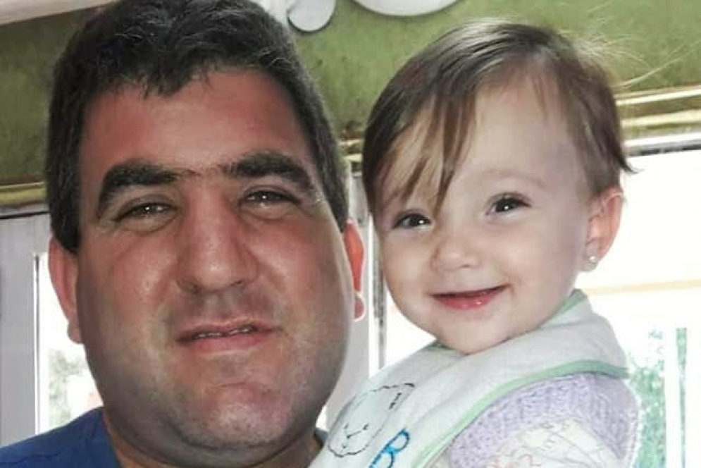 Diego junto a su hijita de un a&ntilde;o y 10 meses, previo al contagio.